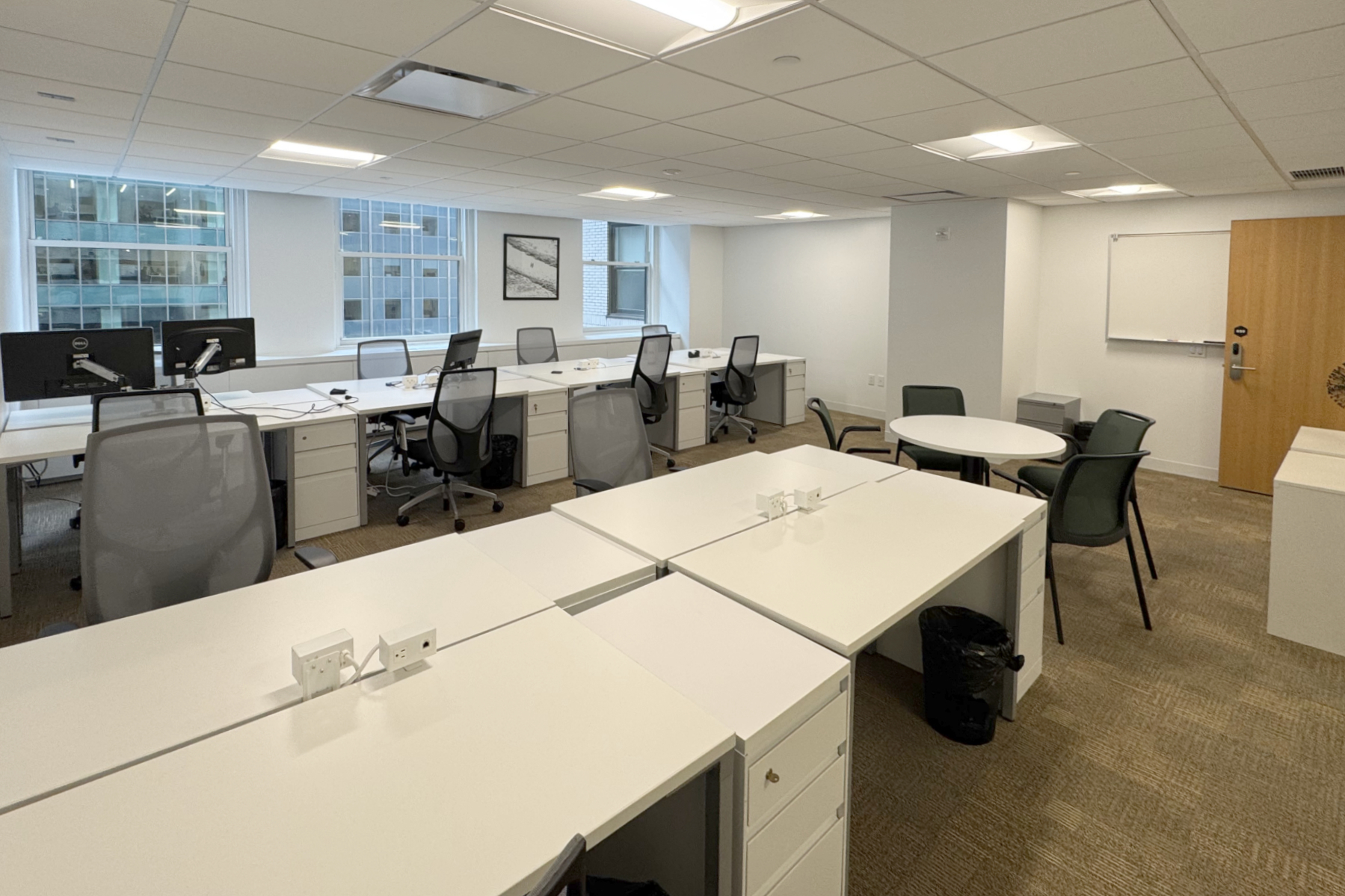 Illustrated private office with dedicated workstations